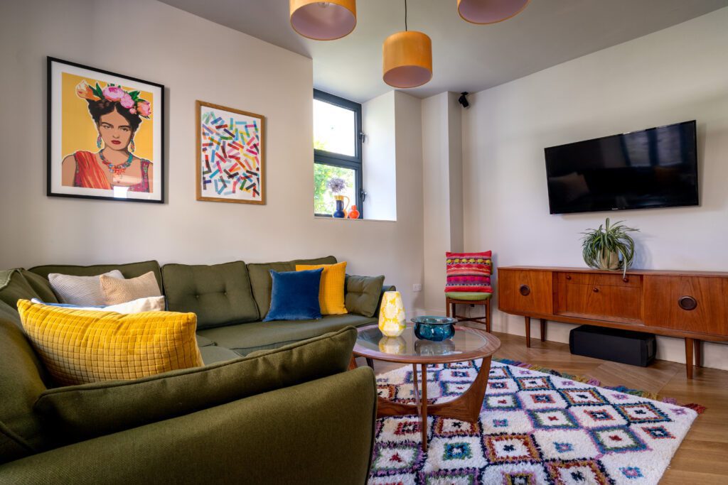 A glass-fronted gem in Kingswear, blending mid-century charm with stunning river and sea views. Architectural Interior Photography by Sue Vaughton