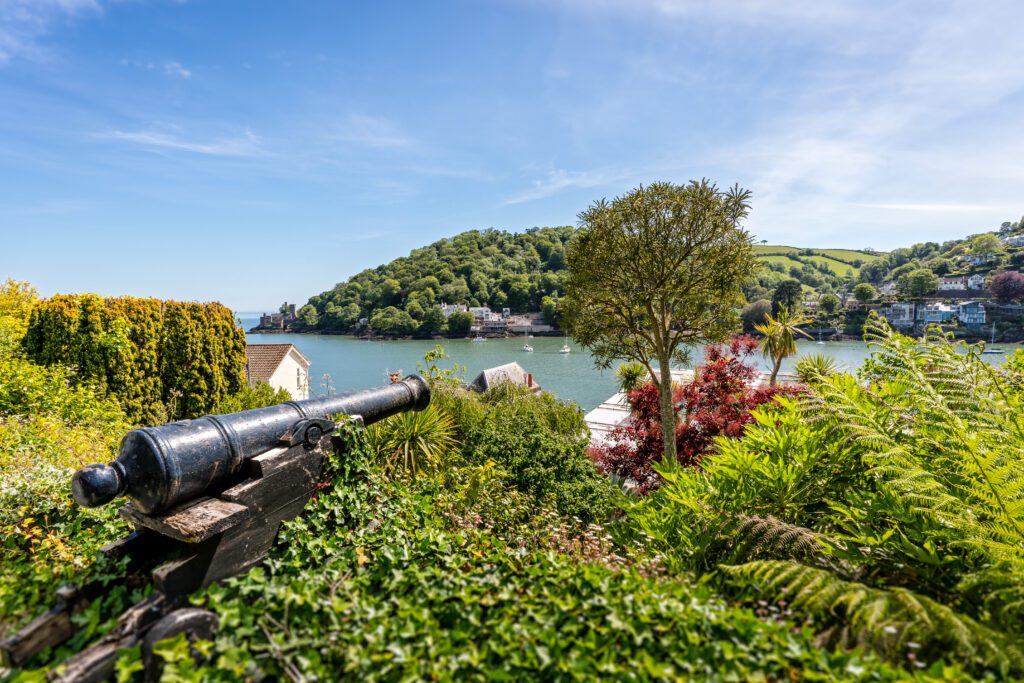 A glass-fronted gem in Kingswear, blending mid-century charm with stunning river and sea views. Architectural Interior Photography by Sue Vaughton