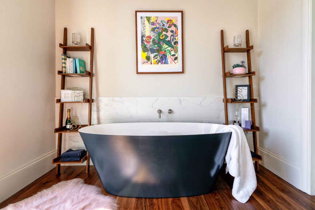 A glass-fronted gem in Kingswear, blending mid-century charm with stunning river and sea views. Architectural Interior Photography by Sue Vaughton