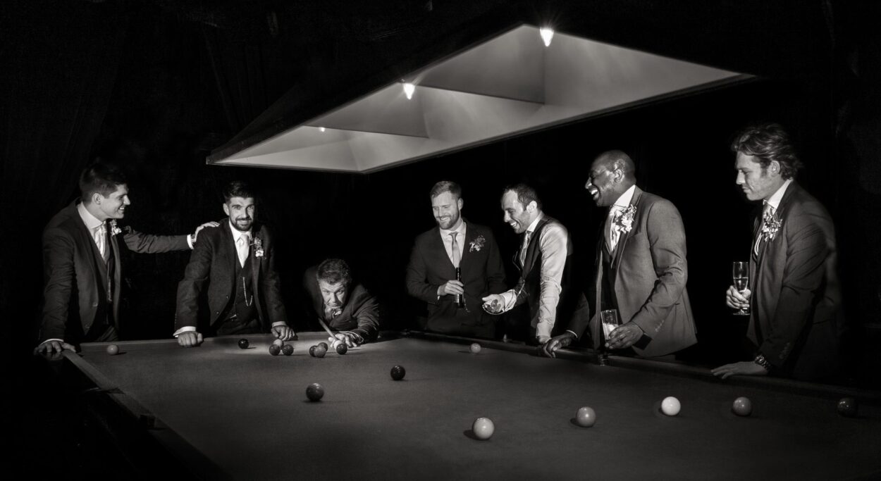 grooms party portrait playing snooker