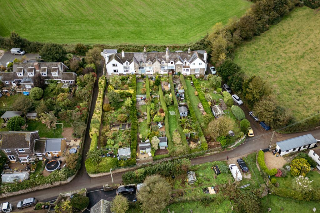 Aerial drone photograph of Pear Tree Cottage in South Milton photographed by Sue Vaughton Photography