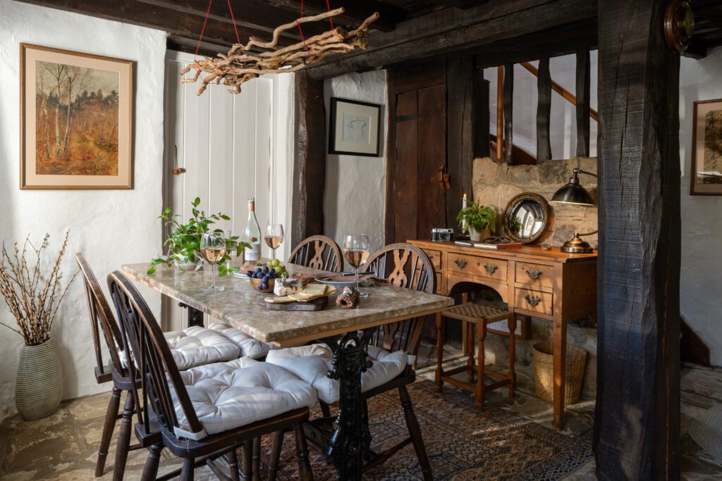 Rustic dining room with wooden beams and furniture Rustic dining room with wooden beams and furniture